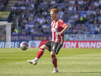 Ryan Woods #6 of Exeter City F.C. during the Sky Bet League 1 match between Bolton Wanderers and Exeter City at the Toughsheet Stadium in Bo...