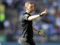 Referee Ben Toner gesticulates during the Sky Bet League 1 match between Bolton Wanderers and Exeter City at the Toughsheet Stadium in Bolto...