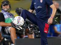 Davide Nicola, head coach of Cagliari Calcio, watches the Serie A match between Lecce and Cagliari in Lecce, Italy, on August 31, 2024. (