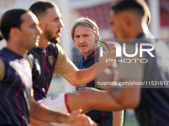 Davide Nicola, head coach of Cagliari Calcio, watches the Serie A match between Lecce and Cagliari in Lecce, Italy, on August 31, 2024. (