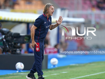 Davide Nicola, head coach of Cagliari Calcio, watches the Serie A match between Lecce and Cagliari in Lecce, Italy, on August 31, 2024. (