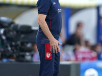 Davide Nicola, head coach of Cagliari Calcio, watches the Serie A match between Lecce and Cagliari in Lecce, Italy, on August 31, 2024. (