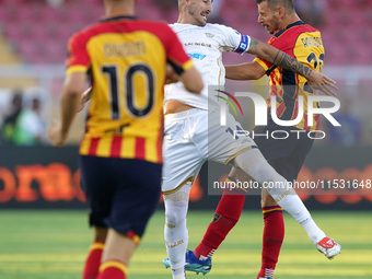 Alessandro Deiola of Cagliari Calcio is in action during the Serie A match between Lecce and Cagliari in Lecce, Italy, on August 31, 2024. (