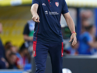 Davide Nicola, head coach of Cagliari Calcio, watches the Serie A match between Lecce and Cagliari in Lecce, Italy, on August 31, 2024. (