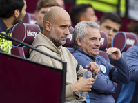 Pep Guardiola of Manchester City during the Premier League match between West Ham United and Manchester City at the London Stadium in Stratf...