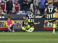 Erling Haaland of Manchester City celebrates his first goal during the Premier League match between West Ham United and Manchester City at t...