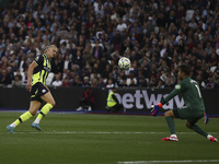 Erling Haaland of Manchester City scores his third goal during the Premier League match between West Ham United and Manchester City at the L...