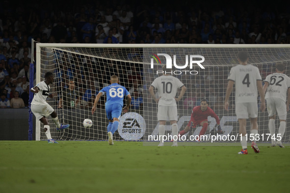 Parma's Ange-Yoan Bonny scores their first goal on a penalty during the Serie A soccer match between SSC Napoli and Parma Calcio at Stadio M...