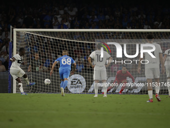 Parma's Ange-Yoan Bonny scores their first goal on a penalty during the Serie A soccer match between SSC Napoli and Parma Calcio at Stadio M...