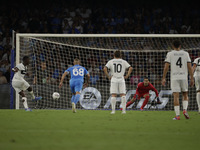 Parma's Ange-Yoan Bonny scores their first goal on a penalty during the Serie A soccer match between SSC Napoli and Parma Calcio at Stadio M...