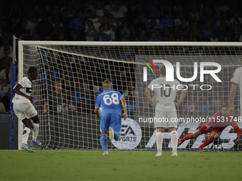 Parma's Ange-Yoan Bonny scores their first goal on a penalty during the Serie A soccer match between SSC Napoli and Parma Calcio at Stadio M...