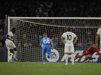 Parma's Ange-Yoan Bonny scores their first goal on a penalty during the Serie A soccer match between SSC Napoli and Parma Calcio at Stadio M...