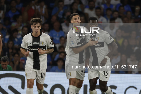 Parma's Ange-Yoan Bonny celebrates after scoring their first goal on a penalty during the Serie A soccer match between SSC Napoli and Parma...