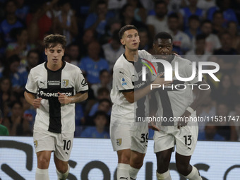 Parma's Ange-Yoan Bonny celebrates after scoring their first goal on a penalty during the Serie A soccer match between SSC Napoli and Parma...