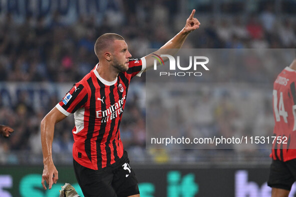 Strahinja Pavlovic of A.C. Milan celebrates after scoring the goal of 0-1 during the 3rd day of the Serie A Championship between S.S. Lazio...