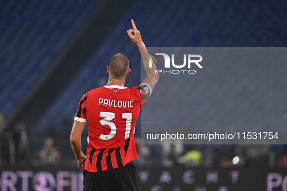 Strahinja Pavlovic of A.C. Milan celebrates after scoring the goal of 0-1 during the 3rd day of the Serie A Championship between S.S. Lazio...