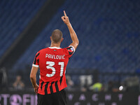 Strahinja Pavlovic of A.C. Milan celebrates after scoring the goal of 0-1 during the 3rd day of the Serie A Championship between S.S. Lazio...