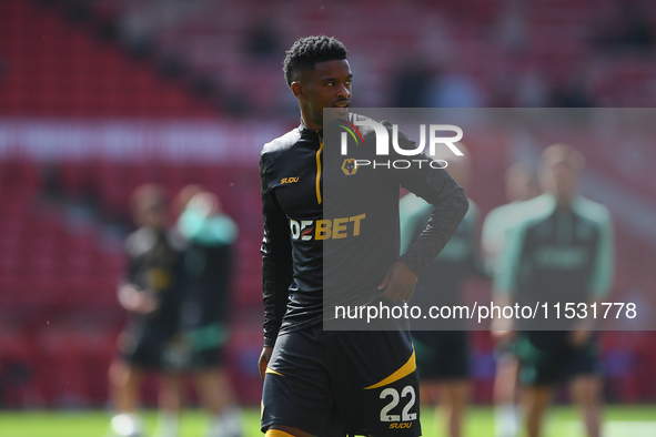 Nelson Semedo of Wolverhampton Wanderers warms up ahead of kick-off during the Premier League match between Nottingham Forest and Wolverhamp...