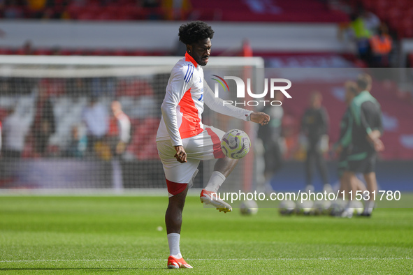 Ola Aina of Nottingham Forest warms up ahead of kick-off during the Premier League match between Nottingham Forest and Wolverhampton Wandere...