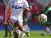 Ola Aina of Nottingham Forest warms up ahead of kick-off during the Premier League match between Nottingham Forest and Wolverhampton Wandere...