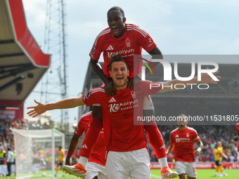 Chris Wood of Nottingham Forest celebrates with Callum Hudson-Odoi of Nottingham Forest after scoring a goal to make it 1-0 during the Premi...