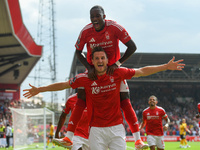 Chris Wood of Nottingham Forest celebrates with Callum Hudson-Odoi of Nottingham Forest after scoring a goal to make it 1-0 during the Premi...