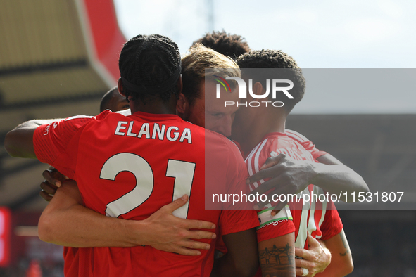 Forest players celebrate after Chris Wood of Nottingham Forest scores a goal to make it 1-0 during the Premier League match between Nottingh...