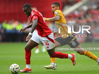 Callum Hudson-Odoi of Nottingham Forest is under pressure from Joao Gomes of Wolverhampton Wanderers during the Premier League match between...