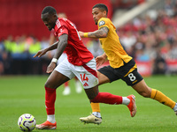 Callum Hudson-Odoi of Nottingham Forest is under pressure from Joao Gomes of Wolverhampton Wanderers during the Premier League match between...