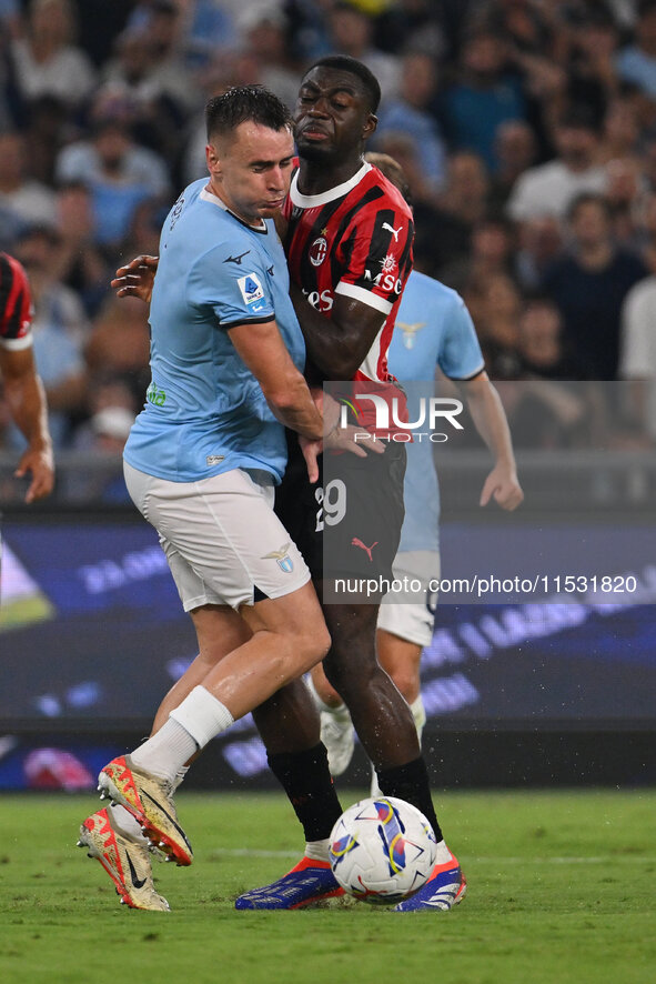 Patric of S.S. Lazio and Youssouf Fofana of A.C. Milan during the 3rd day of the Serie A Championship between S.S. Lazio and A.C. Milan at t...