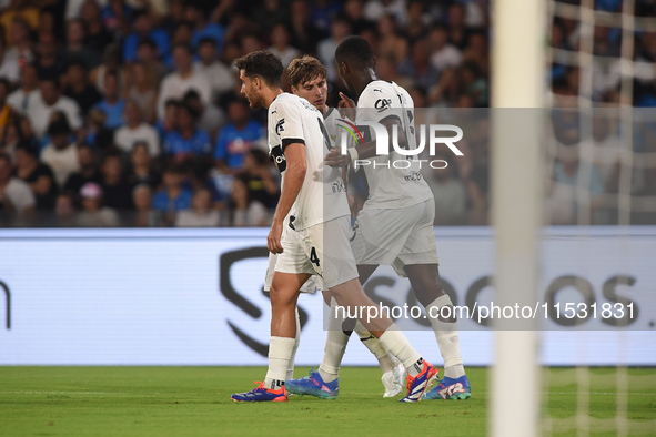 Ange-Yoan Bonny of Parma Calcio celebrates with team mates after scoring during the Serie A match between SSC Napoli and Parma Calcio at Sta...