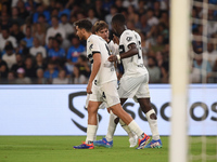 Ange-Yoan Bonny of Parma Calcio celebrates with team mates after scoring during the Serie A match between SSC Napoli and Parma Calcio at Sta...