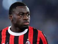 Youssouf Fofana of AC Milan looks on during the Serie A Enilive match between SS Lazio and AC Milan at Stadio Olimpico on Aug 31, 2024 in Ro...