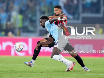 Boulaye Dia of SS Lazio and Ruben Loftus-Cheek of AC Milan compete for the ball during the Serie A Enilive match between SS Lazio and AC Mil...