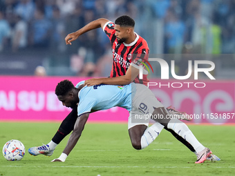 Boulaye Dia of SS Lazio and Ruben Loftus-Cheek of AC Milan compete for the ball during the Serie A Enilive match between SS Lazio and AC Mil...