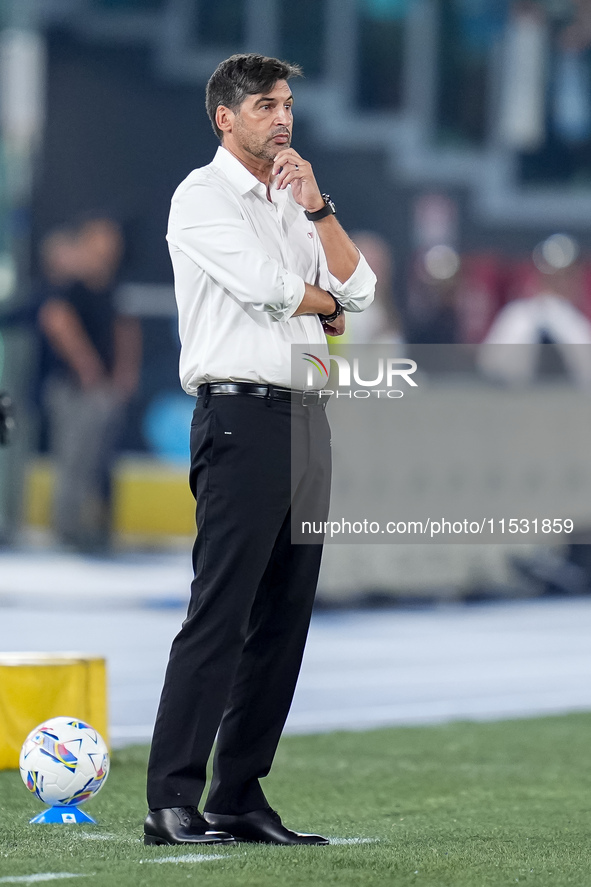 Paulo Fonseca head coach of AC Milan looks on during the Serie A Enilive match between SS Lazio and AC Milan at Stadio Olimpico on Aug 31, 2...