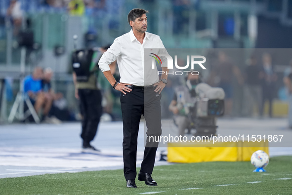 Paulo Fonseca head coach of AC Milan looks on during the Serie A Enilive match between SS Lazio and AC Milan at Stadio Olimpico on Aug 31, 2...