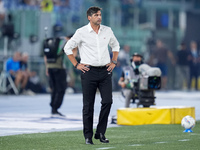 Paulo Fonseca head coach of AC Milan looks on during the Serie A Enilive match between SS Lazio and AC Milan at Stadio Olimpico on Aug 31, 2...