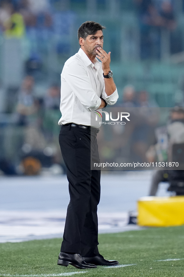 Paulo Fonseca head coach of AC Milan looks on during the Serie A Enilive match between SS Lazio and AC Milan at Stadio Olimpico on Aug 31, 2...