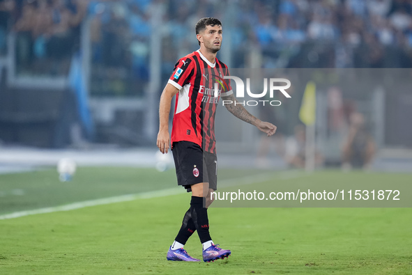 Christian Pulisic of AC Milan looks on during the Serie A Enilive match between SS Lazio and AC Milan at Stadio Olimpico on Aug 31, 2024 in...