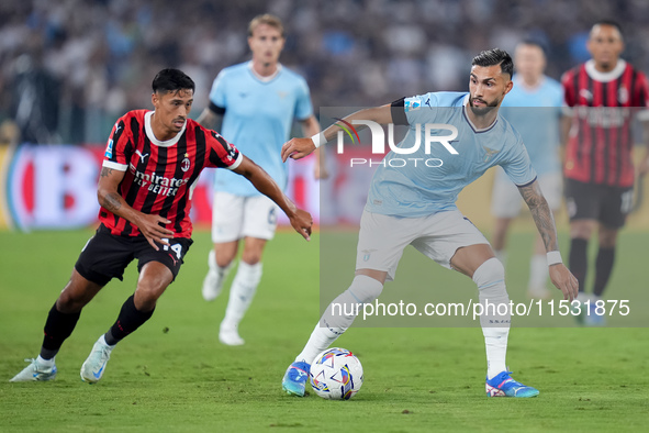 Taty Castellanos of SS Lazio and Tijjani Reijnders of AC Milan compete for the ball during the Serie A Enilive match between SS Lazio and AC...