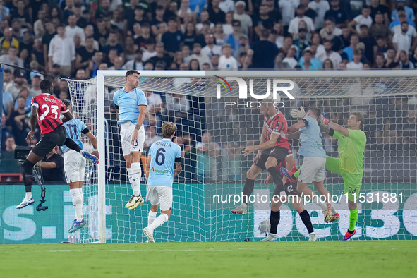 Strahinja Pavlovic of AC Milan scores first goal during the Serie A Enilive match between SS Lazio and AC Milan at Stadio Olimpico on Aug 31...