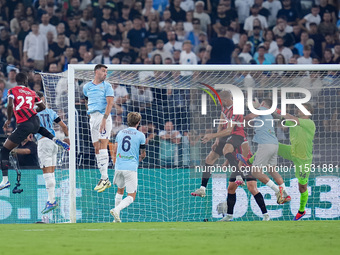 Strahinja Pavlovic of AC Milan scores first goal during the Serie A Enilive match between SS Lazio and AC Milan at Stadio Olimpico on Aug 31...