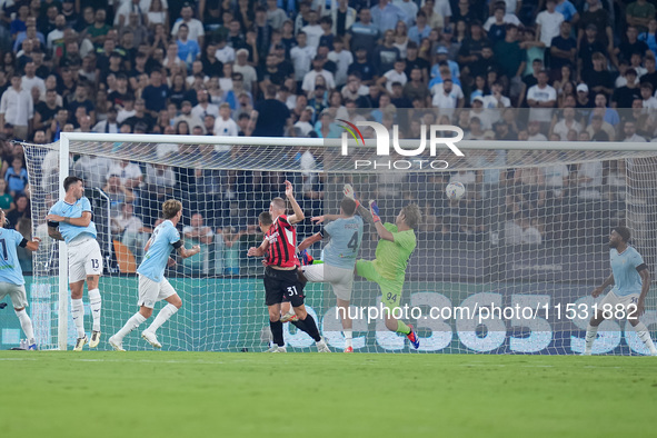 Strahinja Pavlovic of AC Milan scores first goal during the Serie A Enilive match between SS Lazio and AC Milan at Stadio Olimpico on Aug 31...