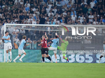 Strahinja Pavlovic of AC Milan scores first goal during the Serie A Enilive match between SS Lazio and AC Milan at Stadio Olimpico on Aug 31...