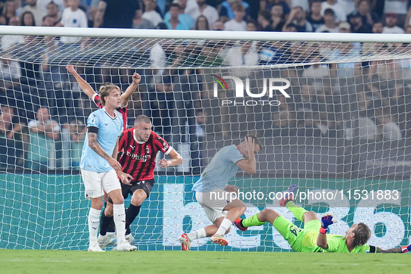 Strahinja Pavlovic of AC Milan celebrates after scoring first goal during the Serie A Enilive match between SS Lazio and AC Milan at Stadio...