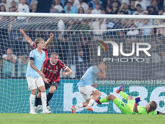 Strahinja Pavlovic of AC Milan celebrates after scoring first goal during the Serie A Enilive match between SS Lazio and AC Milan at Stadio...