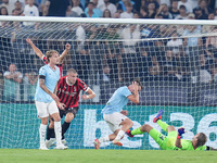 Strahinja Pavlovic of AC Milan celebrates after scoring first goal during the Serie A Enilive match between SS Lazio and AC Milan at Stadio...