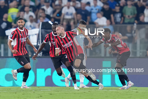 Strahinja Pavlovic of AC Milan celebrates after scoring first goal during the Serie A Enilive match between SS Lazio and AC Milan at Stadio...