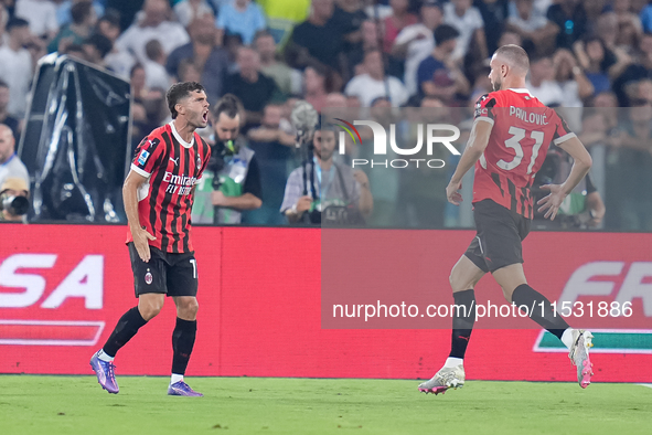 Strahinja Pavlovic of AC Milan celebrates after scoring first goal during the Serie A Enilive match between SS Lazio and AC Milan at Stadio...